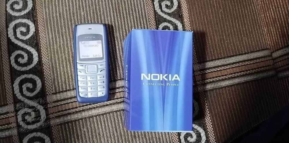 Vand Nokia 1112 in stare foarte buna- ca NOU