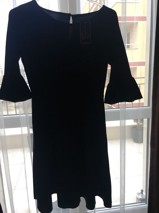 Елегантна рокля.