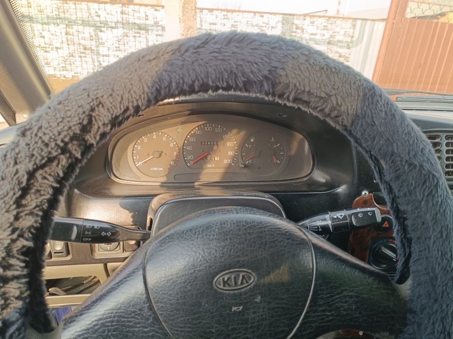 Автомобиль киа спортейж