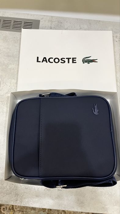 Продам абсолютно новую lacoste барсетку 100% оригинал любые проверки