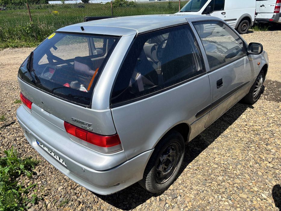 Suzuki Swift 2003 automata, clima