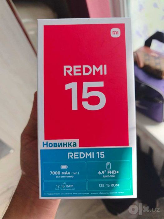 Redmi 15 Ayol kishi tutgan Idealniy telefon