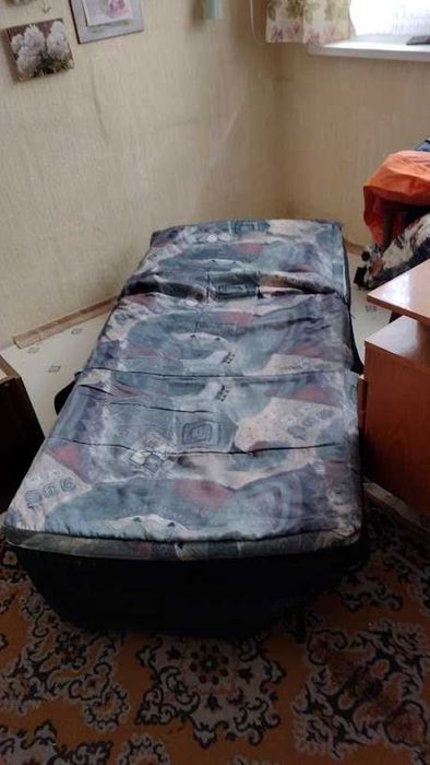 Кресло, отварящо се до едично легло