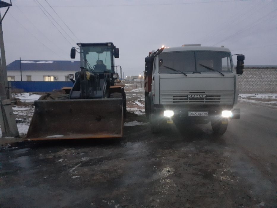 Погрузчик Камаз.