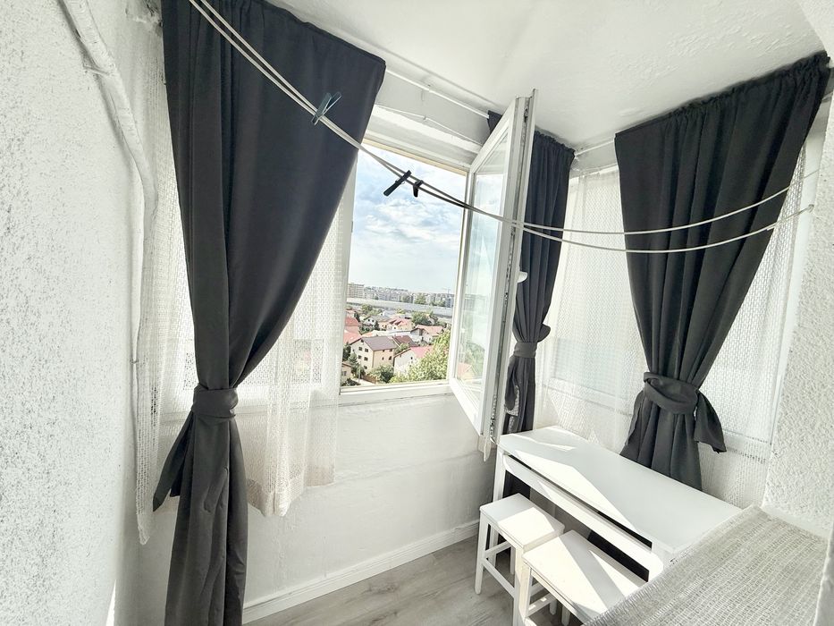 Garsoniera berceni grand arena proprietar