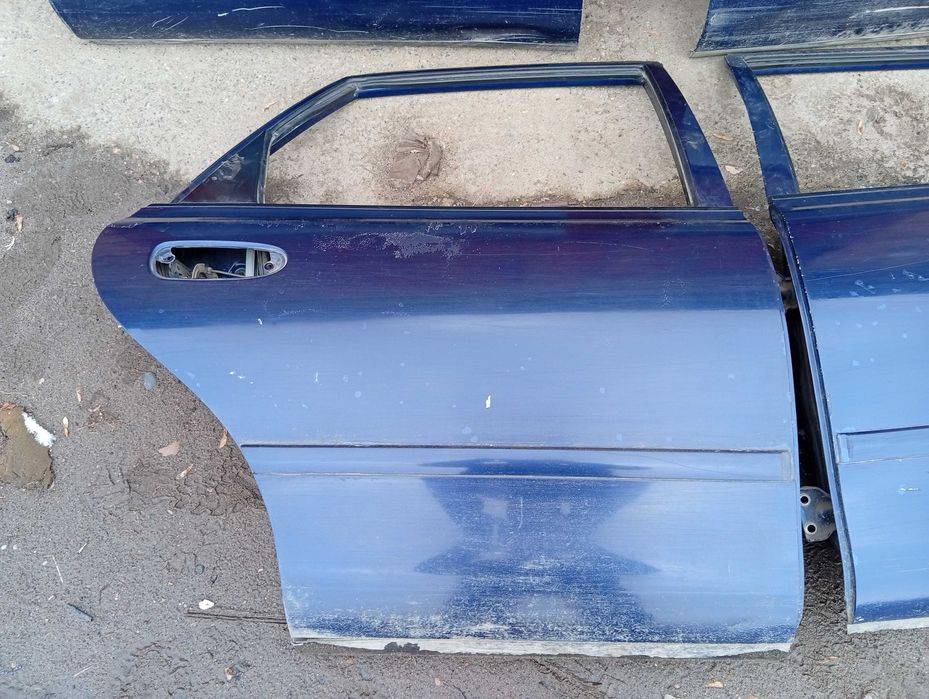 Двери Mazda Cronos Хэтчбек