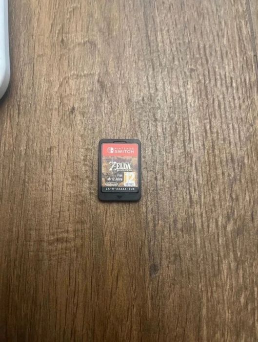 Nintendo Switch OLED alb + Zelda BOTW – Stare impecabilă