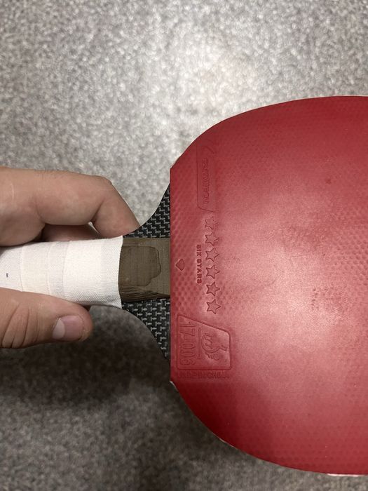 Теннисная ракетка