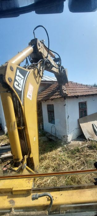 Buldoexcavator,camioneta basculabila,,nisip,pietris,pamant,moluz
