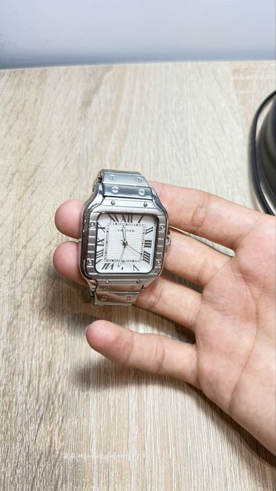 часы Cartier купил месяц назад