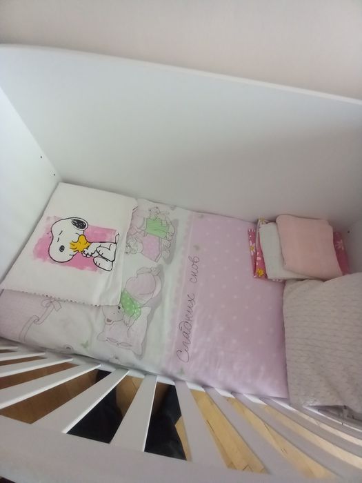 Детско легло с люлеещ механизъм