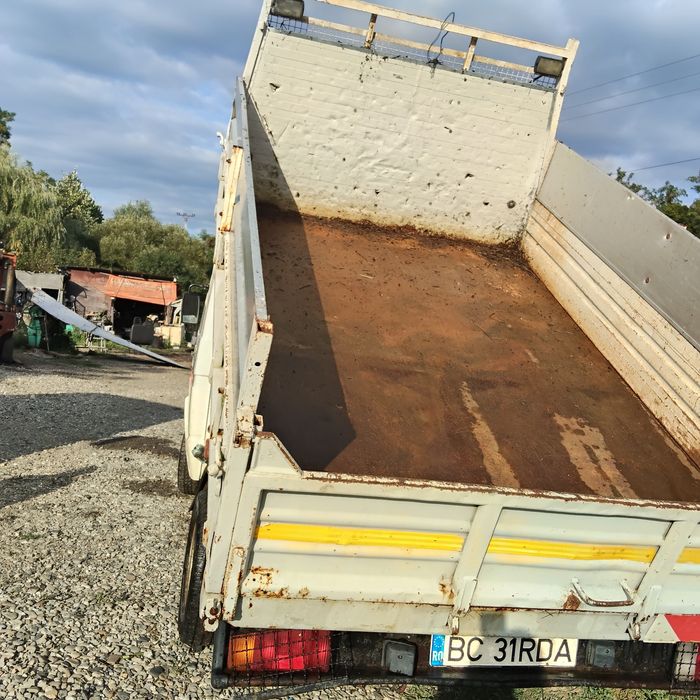 Iveco basculabil trei părți