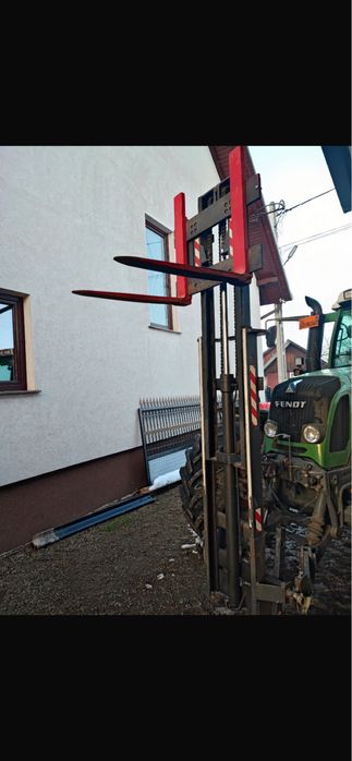 Vând braț de stivuitor care se prinde în tiranți