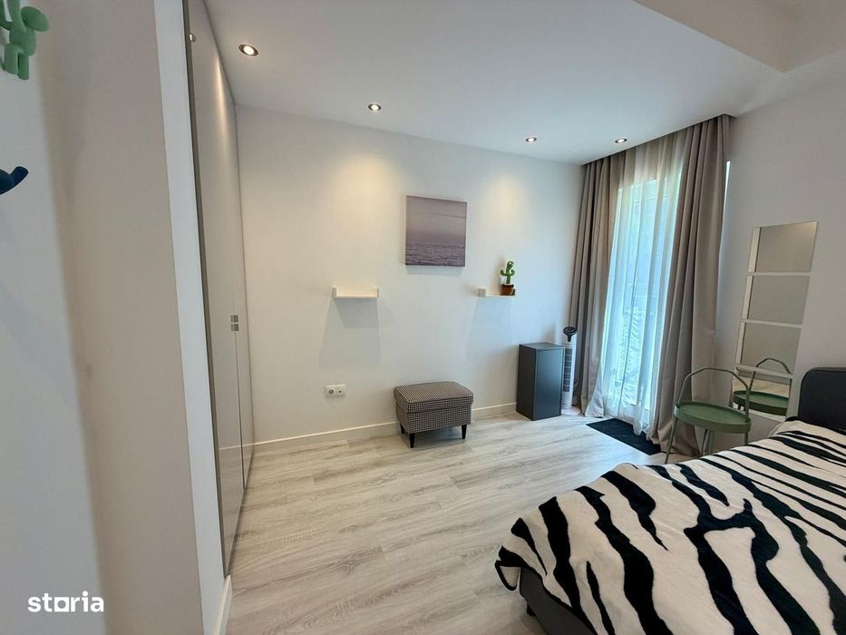 COSMOPOLIS - Apartament cu 3 camere si gradina, mobilat si utilat.