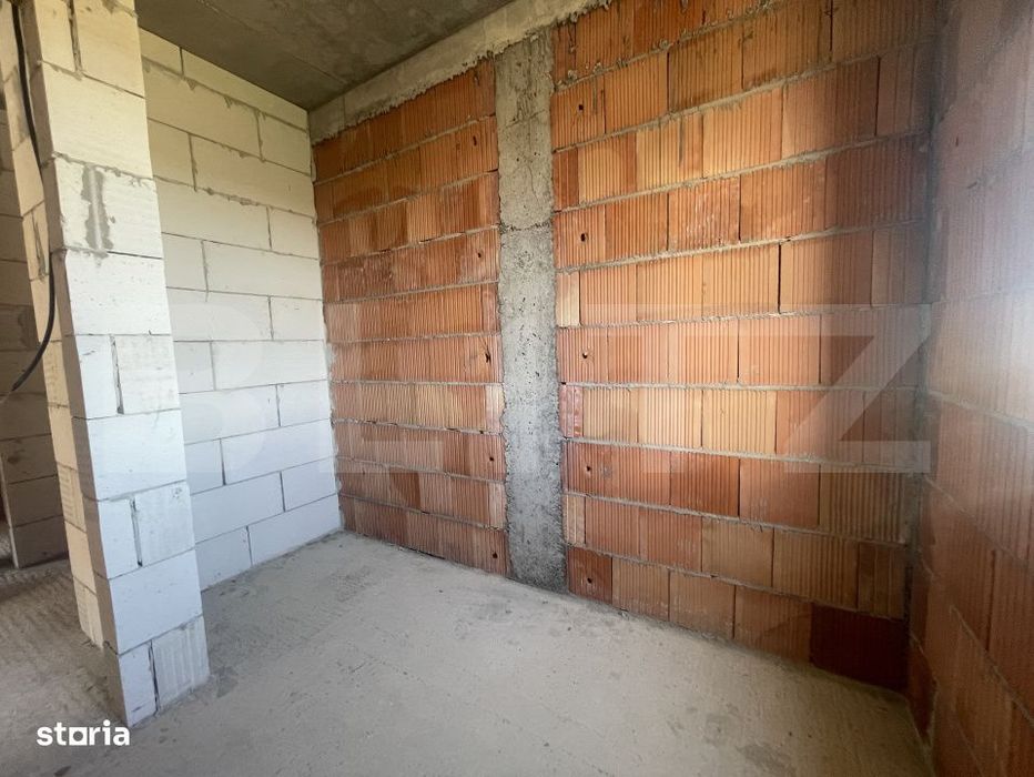 Apartament cu 3 camere, dispus pe doua niveluri, cu gradina