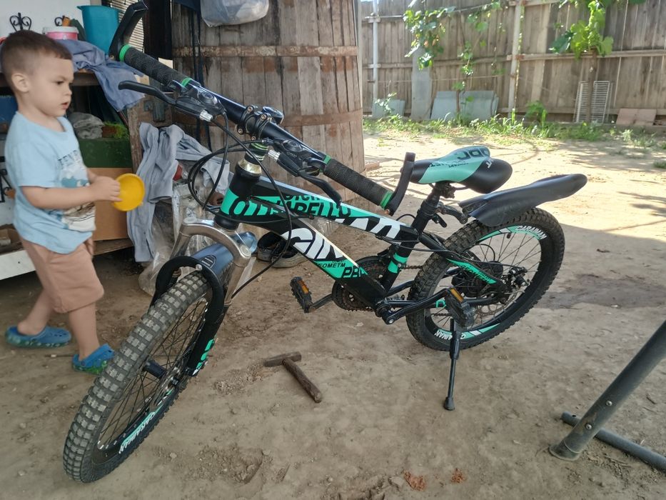 Giant Caraiman 20"frâne disc 21 viteze 7 și 12 ani.