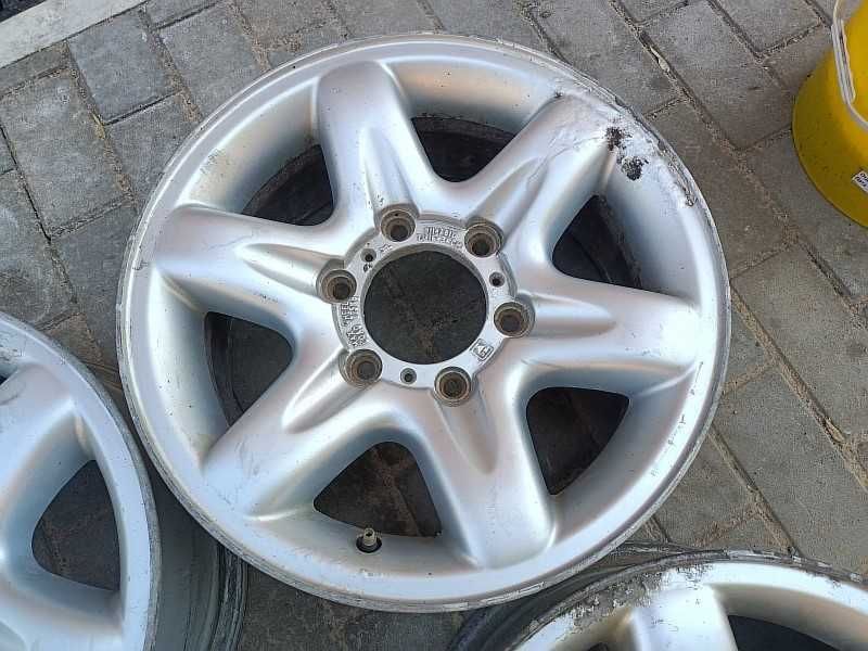 Продам оригинальные легкосплавные диски на Opel Frontera