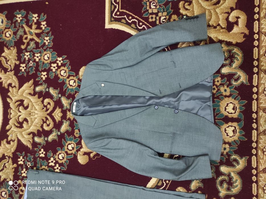 Костюм новый киылмеген