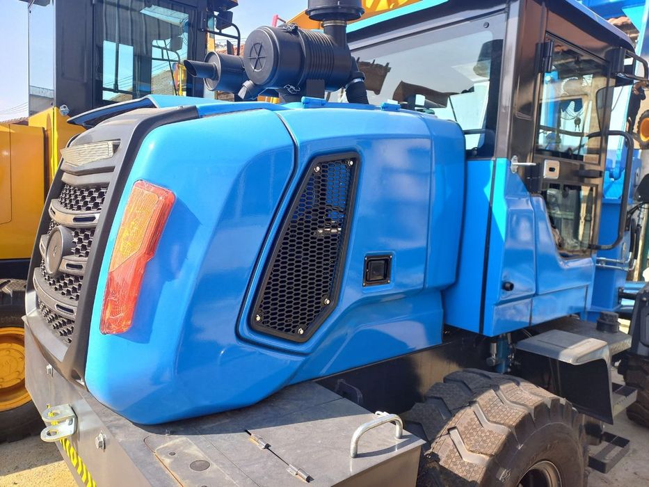 Погрузчик фронталный