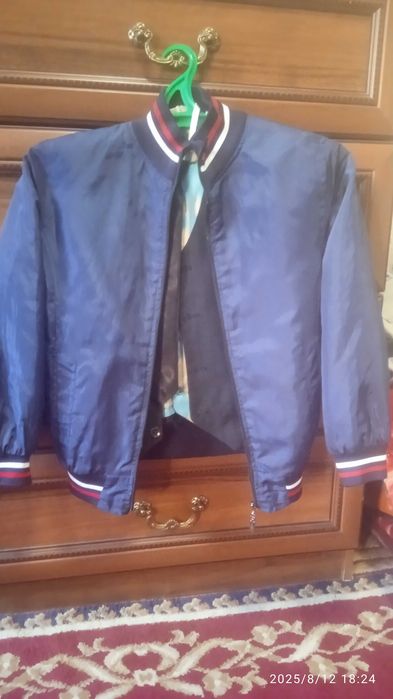 Детский сифатли ва модний Ветрофка тезда сотилади кўк рангда