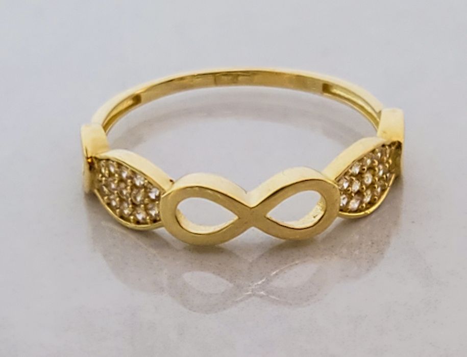 Inel din aur 14K model Infinit cu pietre semiprețioase albe
