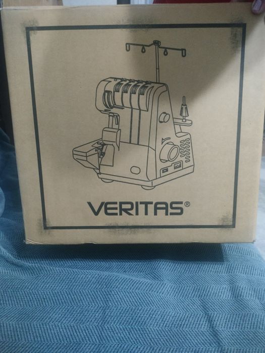 Оверлок швейная машинка