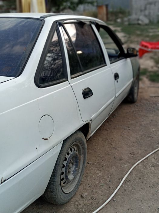 Машина nexia 2012 г