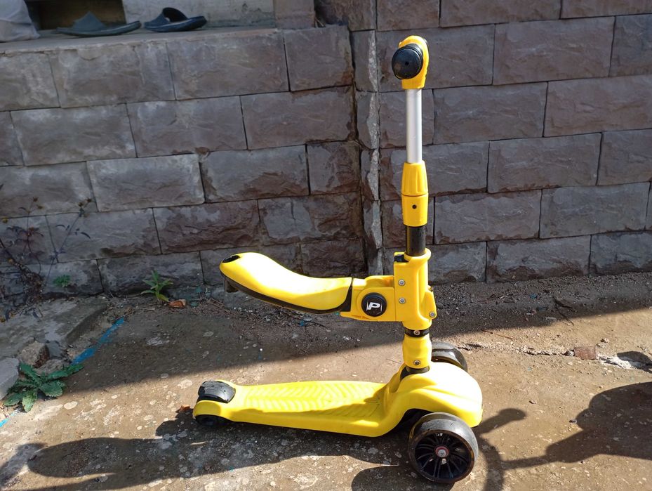 Детский самокат с сиденьем