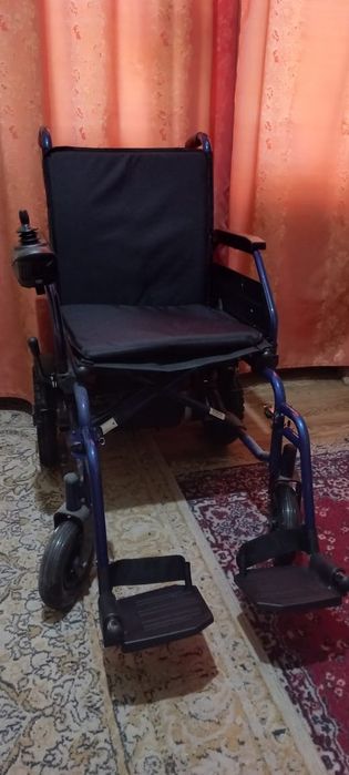 Инвалидная коляска с электроприводом