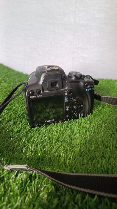 Продам фотоаппарат Canon Eos 1000D