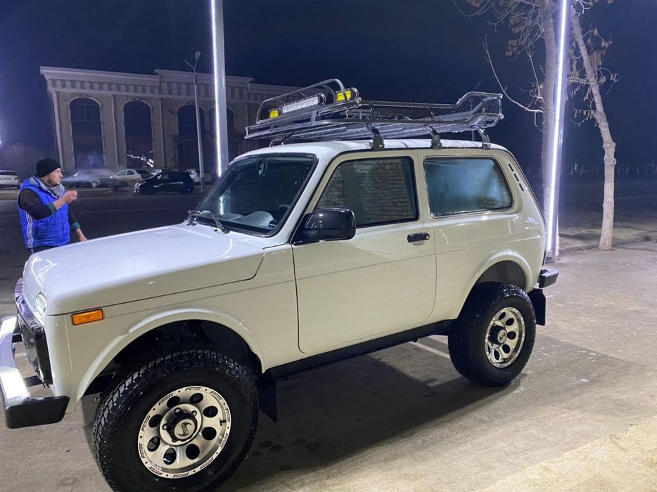 Багажник мошинани томига нивага