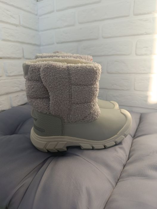 Продам новые сапоги.