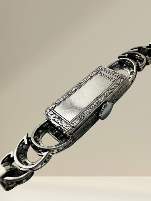 Платинен дамски часовник с диаманти