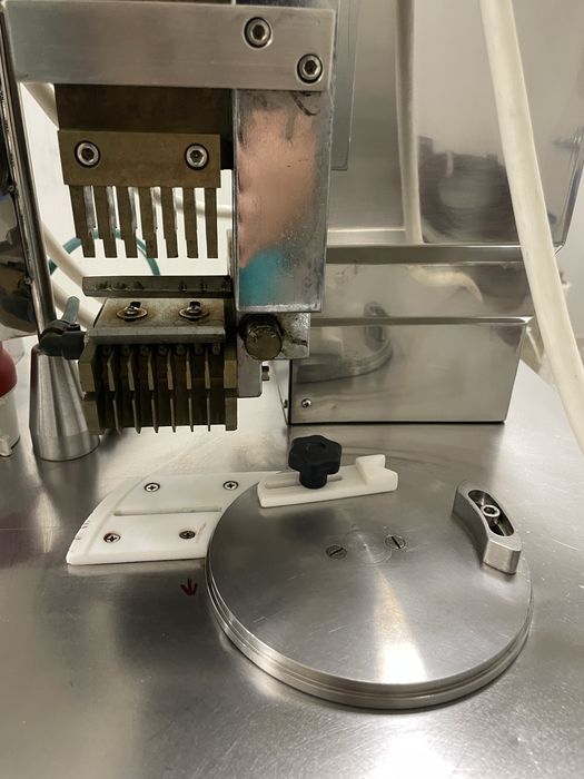 Капсулираща машина