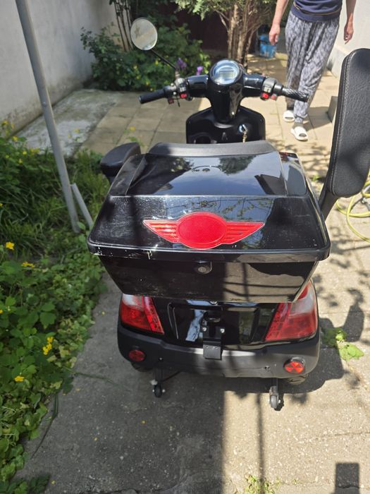 Scuter electric handicap