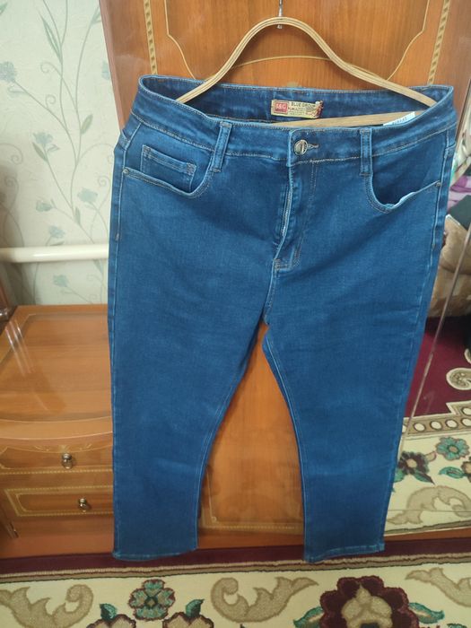 Джинсы с высокой посадкой , клёш