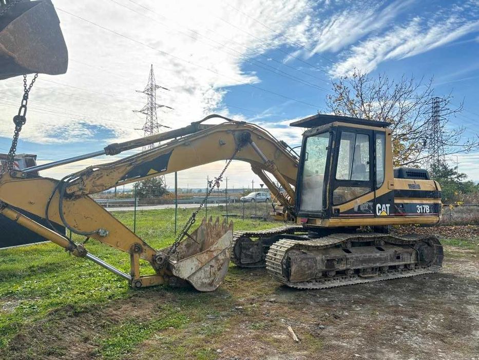Dezmembrez piese  excavator pe senile Caterpillar 318 BL