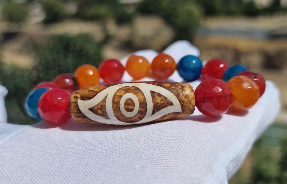 Браслеты с Бусинами Дзи.