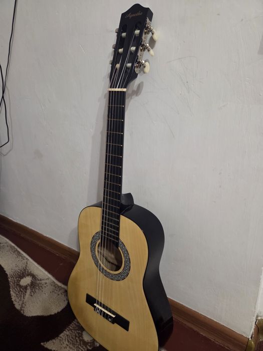 Детская гитара любительская