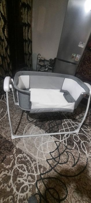 Кроватка с автоукачиванием
