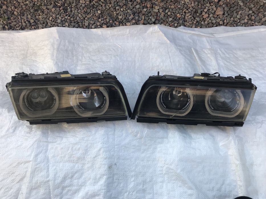 Бампера BMW E38 фары