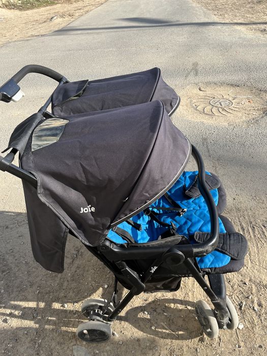 Двойная коляска черная