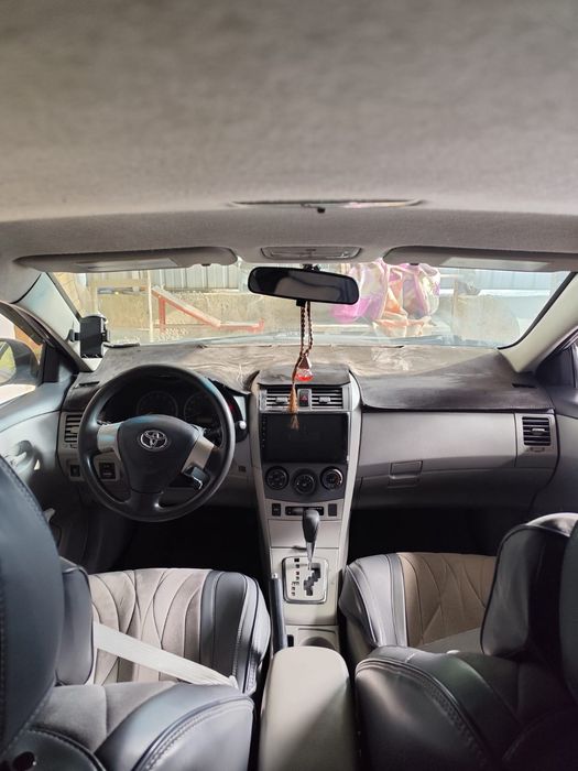 Машина Тайота каролла