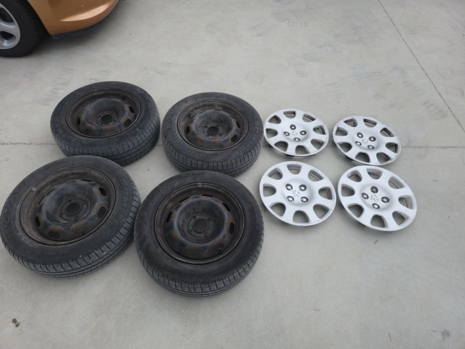 Оригинални джанти с два комплекта  гуми и тасове за Peugeot  15" 4×108,  65,1