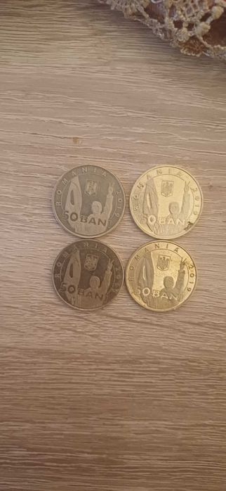 Vand 4 monede de la revolutia din 1998 in stare foarte bunna