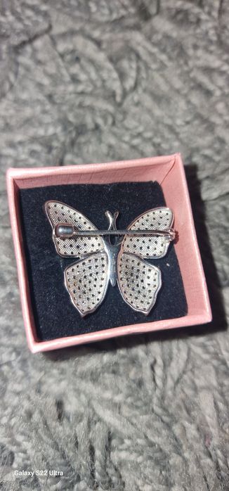 Брошь серебро ,новое.