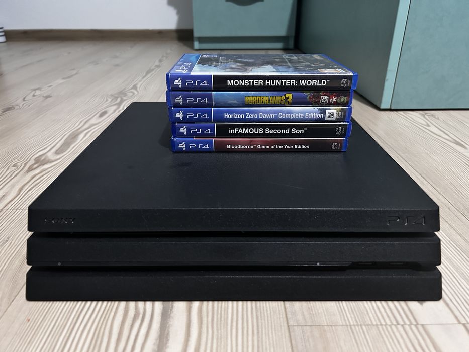 Playstation PS 4 PRO complet cu 5 jocuri