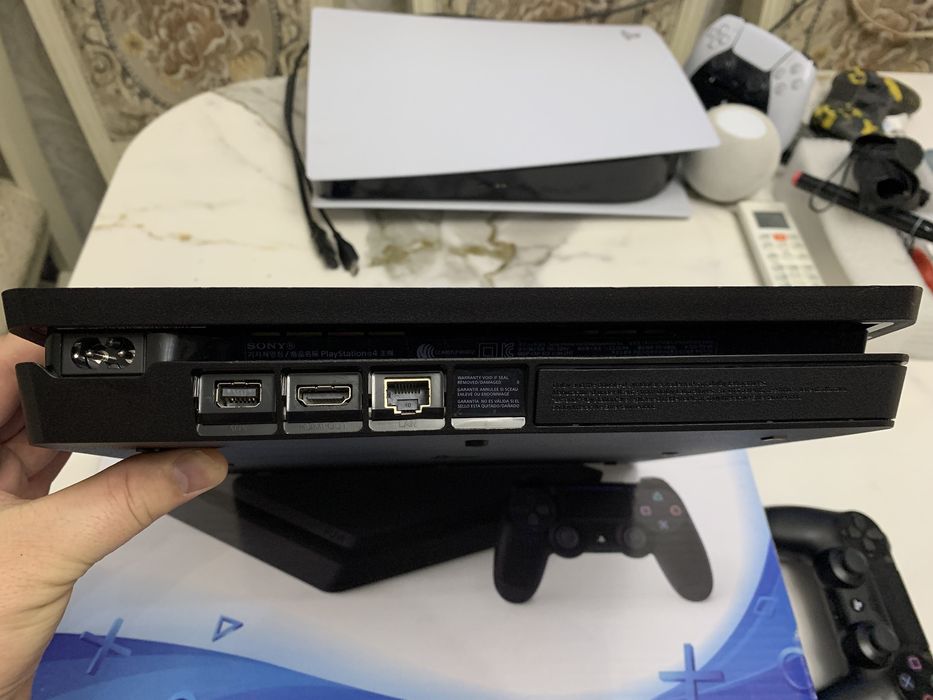 Продам playststion4 slim 1TB с играми на борту как на фото