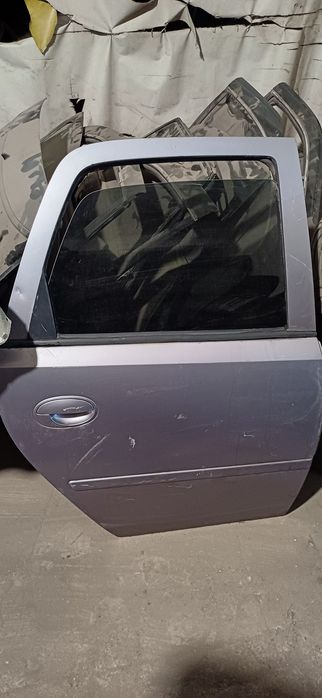 Дверь опель мерива