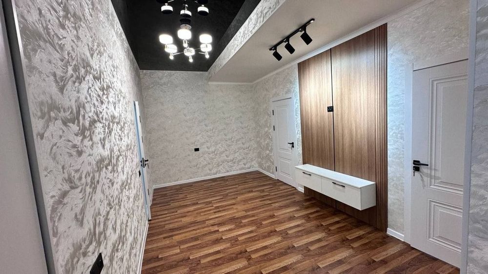 Янги 5каватли домнинг 5етажидаги 3хоналик килинган квартира сотилади